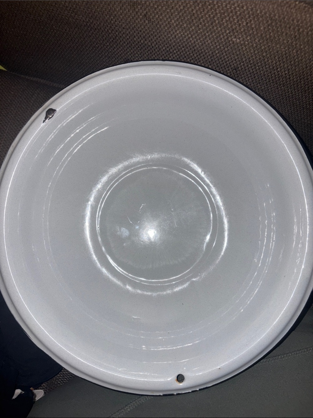 While Vintage Enamel Bowl with Dark Trim Dropped & chipped left upper side 12 in